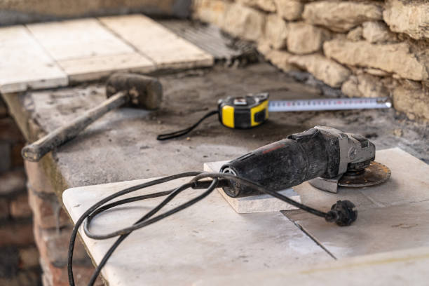 istock DIY home improvement. Building stone barbeque. 1739698014
