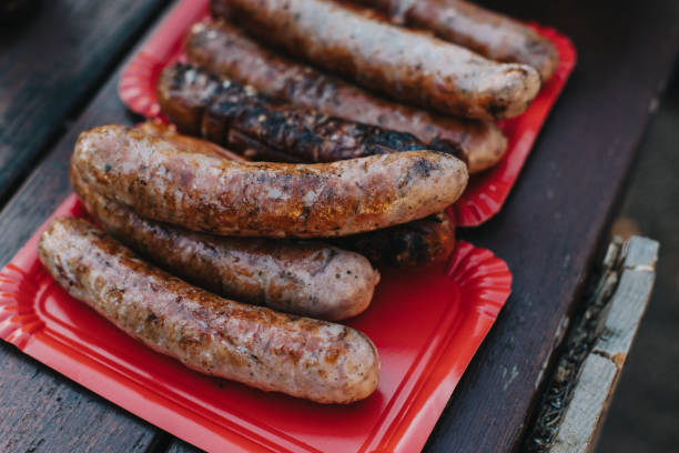 istock Delicious grilled sausage on a barbecue. Picnic menu. 1739823590