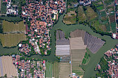 Vertical aerial view of rivers, rural areas, and farmland