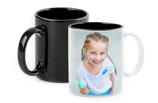 Happy little girl printed on chameleon cup isolated on white background