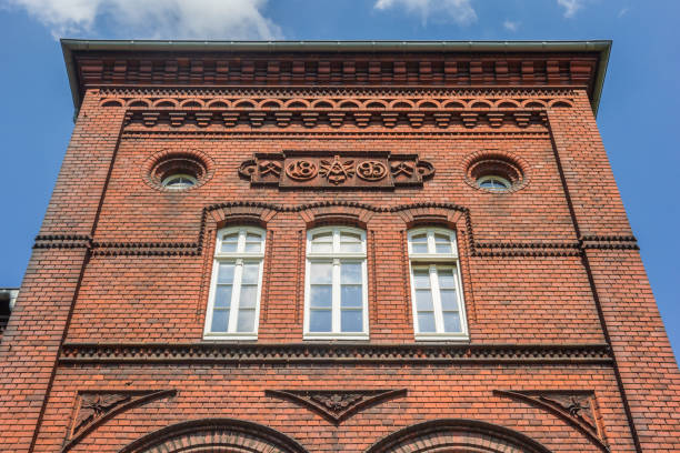 istock Front facade of a historic red brick house in Essen 1739875820
