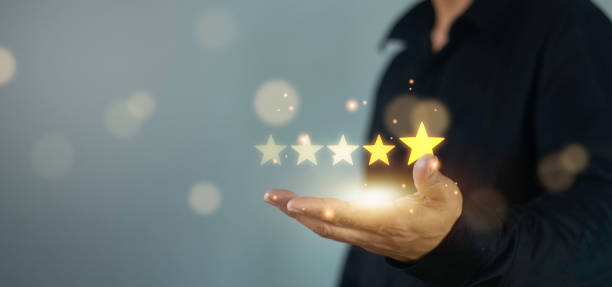 istock Business people touching on virtual screen on five star, customer service and satisfaction concept. Experience and feedback of customers. Rating very impressed. 1739880793