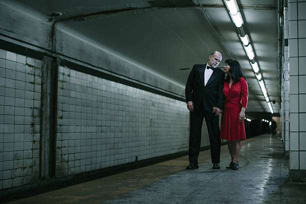 istock elegant couple waiting for the subway 173988727