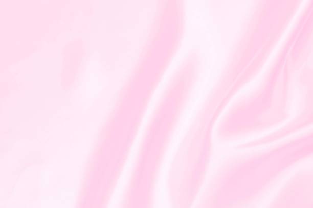 istock Plastic pink satin fabric texture soft blur background 1739913371