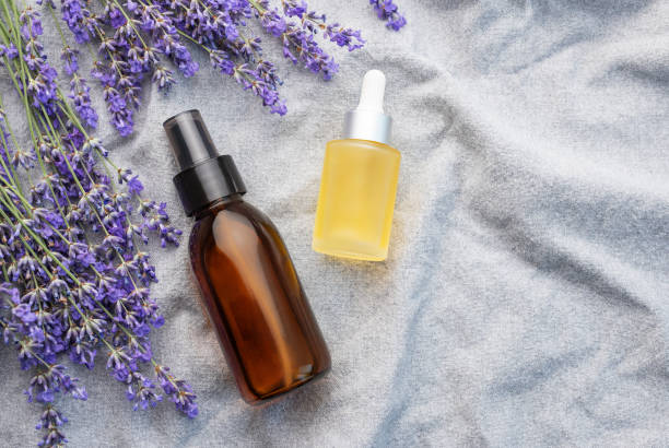 istock Lavender spa. Lavender  natural essential oil and fresh lavender 1740065795