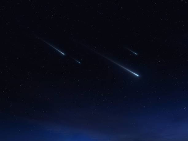istock Meteors glow in the night sky. 1740120721