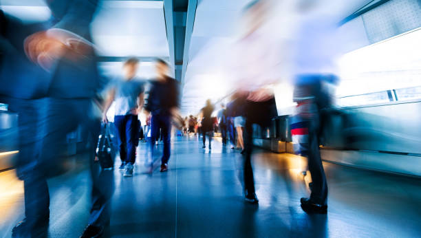 Business people rushing in the lobby