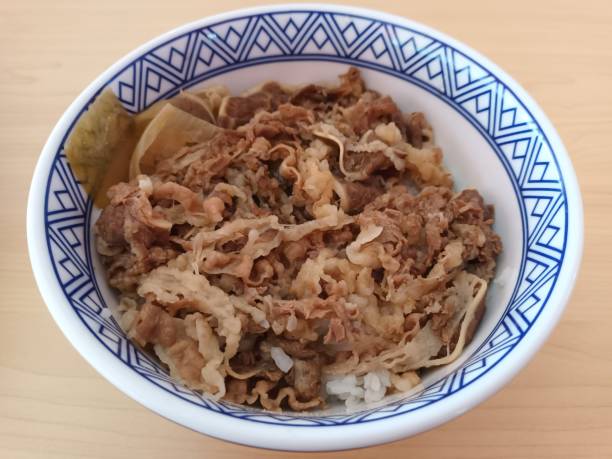 istock One portion of rice with stir-fried chicken 1740164398