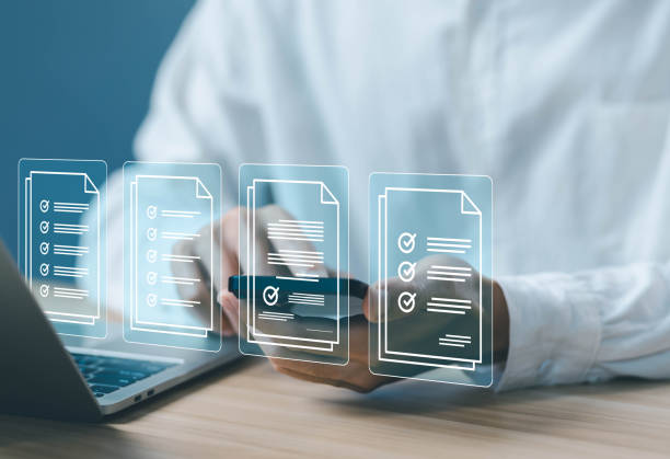 istock person ticks the checkmark on his phone 1740172867