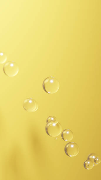 istock 3D Illustration.Lots of transparent bubbles on gold background. (Vertical) 1740181941