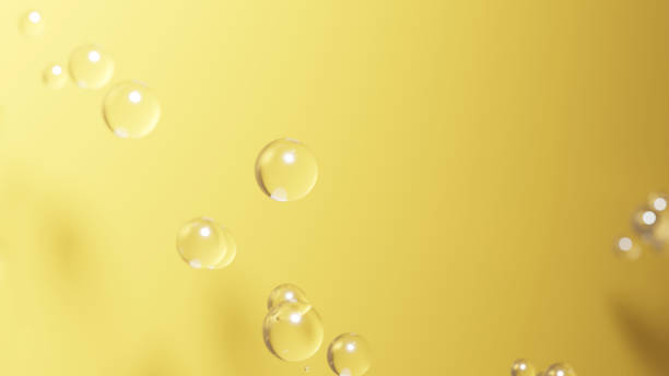 istock 3D Illustration.Lots of transparent bubbles on gold background. (Horizontal) 1740181942