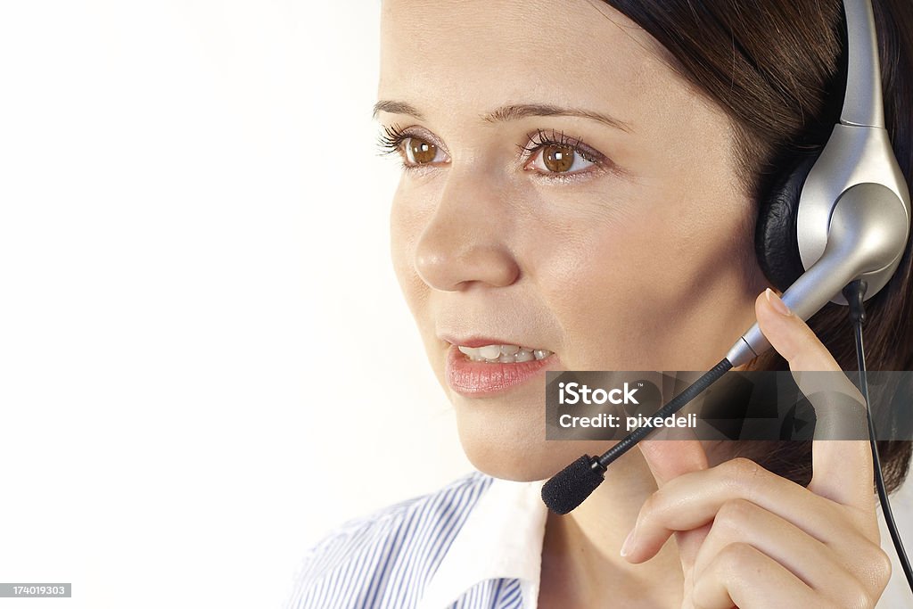 Customer support girl with headset. 20-24 Years Stock Photo