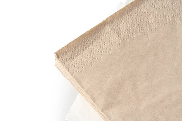 istock Stack of paper napkins on white background 1740196574