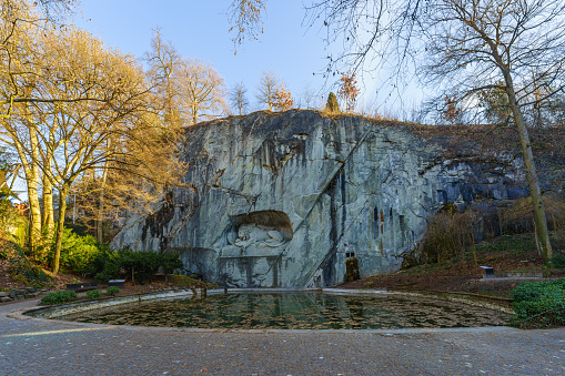 Lucerne, Switzerland - February 21, 2023:View of the Lion Monument (Lowendenkmal), commemorates the Swiss Guards who were massacred in 1792 during the French Revolution. Lucerne (Luzern), Switzerland