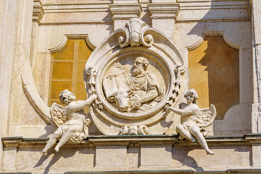 Mantua, Italy - February 28, 2023: View of decoration carving on the cathedral facade, in Mantua (Mantova), Lombardy, Northern Italy