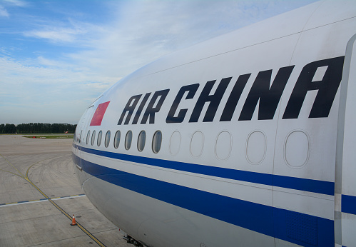 Beijing, China - Aug 14, 2016. A Boeing 777-300ER airplane of Air China docking at Beijing Capital International Airport (PEK).