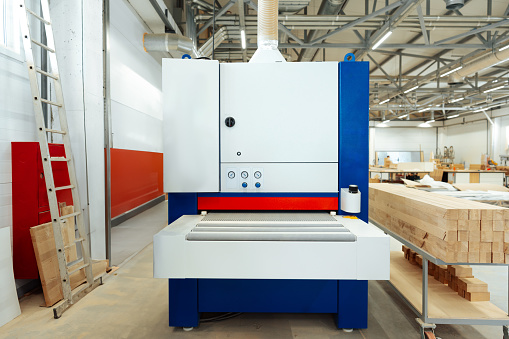 Woodworking equipment in a furniture manufacture workshop in work