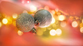 Christmas decorations, silver glitter balls  for decorate Christmas tree branches. Christmas and New Year celebration, background for greetings.