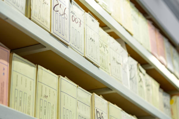 istock Shelving with sewing accessories in boxes in textile factory 1740225059