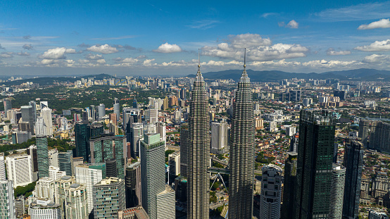 Kuala Lumpur, Malaysia - September 11, 2022: Aerial drone of Kuala Lumpur, capital of Malaysia. Petronas twin towers.