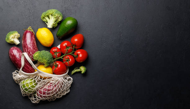 istock Mesh bag filled with a variety of vegetables 1740274955