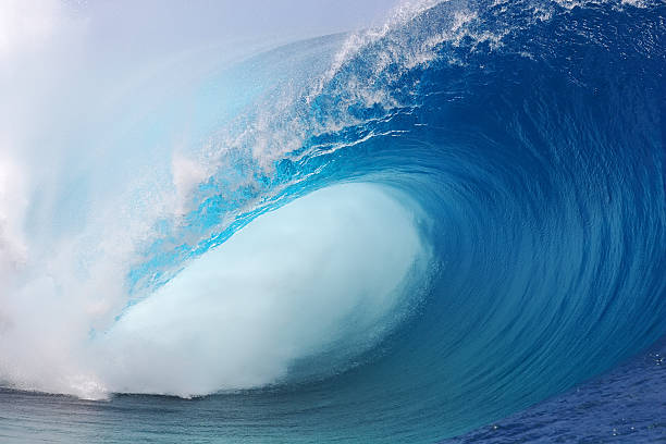 Tahiti Wave One of the worlds heaviest waves breaks in Tahiti tsunami wave stock pictures, royalty-free photos & images