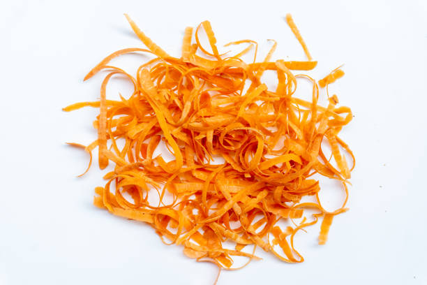 istock Fresh carrot peel isolated on white background 1740283967