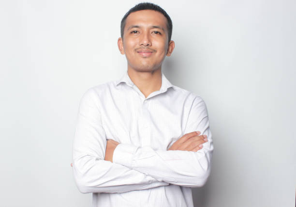istock Asian young man wearing white shirt 1740294596