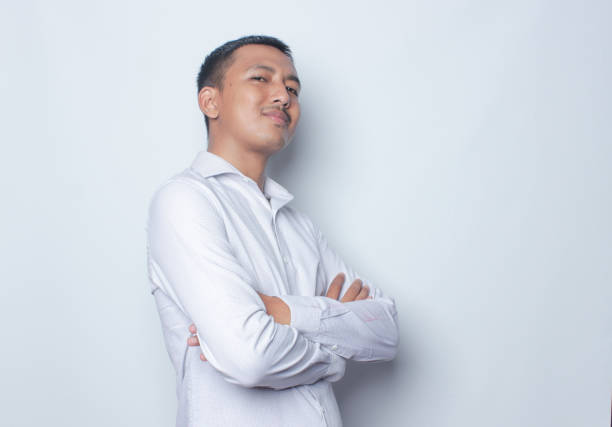 Asian young man with expression and gesturing.