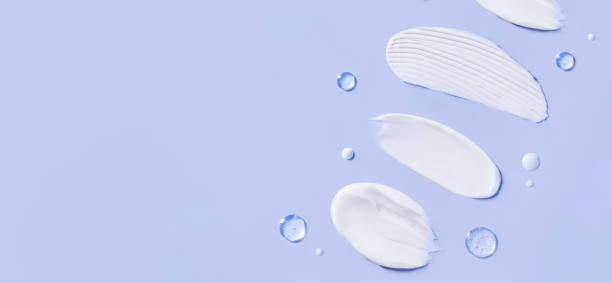 istock banner cosmetic smears cream texture on pastel background 1740298002