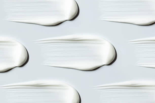 istock pattern cosmetic smears of creamy texture on gray background 1740299147