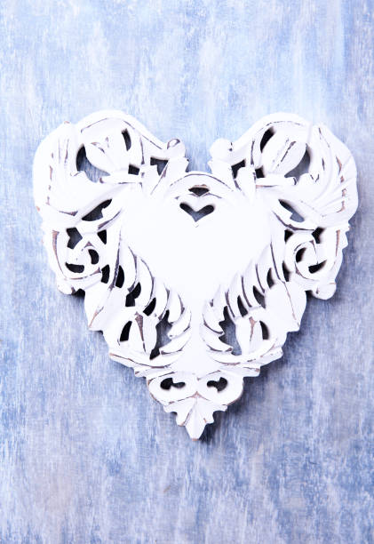 istock Wooden Heart (Christmas ornament) on bright background. Soft focus. Top view. Copy space. 1740320707