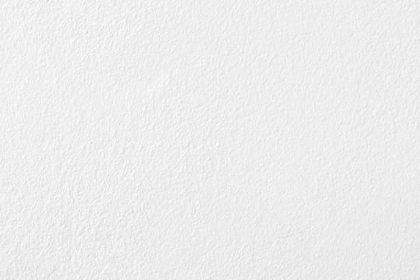 istock White gray concrete cement wall texture for background and design art work. 1740322110