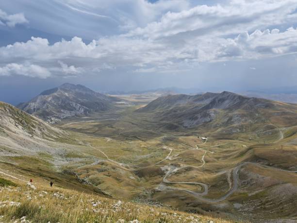 istock Scenic view of a mountain range on a cloudy day 1740355216