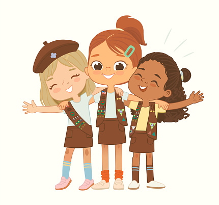 Happy multi ethnic multi aged Brownies girls scout hug. Girls Scout happily hug and smile. Girl together. Brownies Girls Scout