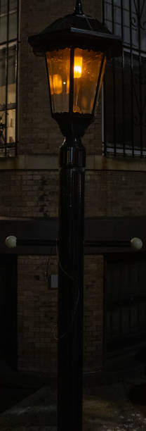 black lantern near brownstone