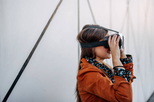 istock Woman uses a virtual reality glasses 1740431012