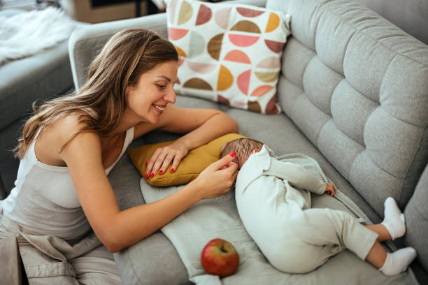 istock Mother with her baby at home 1740432265