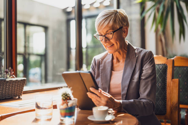 istock Businesswoman in cafe 1740435746