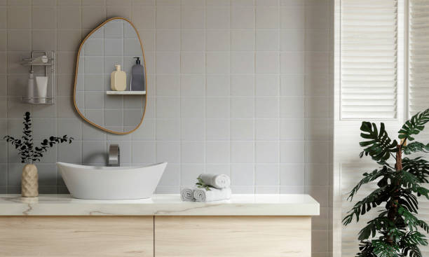 istock 3D render an empty counter with ceramic washbasin and modern style white bathroom 3d render, white wall and mirrors, The room has large windows. 3d render 1740448887