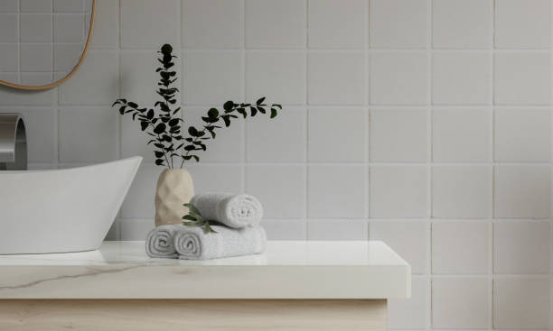 istock counter with ceramic washbasin and modern style white bathroom 3d render, white wall and mirrors, The room has large windows. 3d render 1740449201