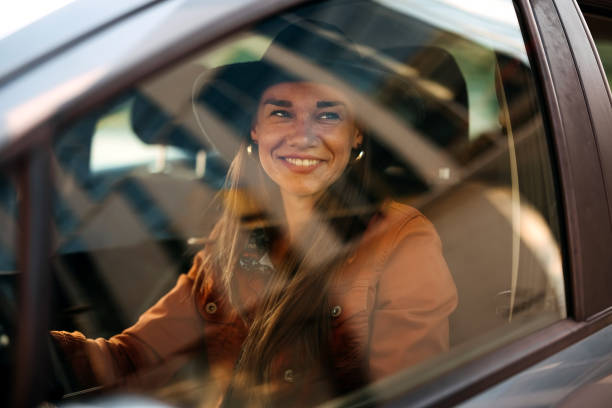 istock Woman drives a car 1740449748