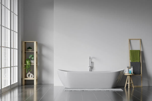 istock Minimal style white bathroom 3d render, white wall and ceramic floor, The room has large windows. 3d render 1740455521