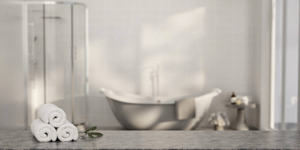 istock Minimal style white bathroom 3d render, white wall and ceramic floor, The room has large windows. 3d render 1740460088