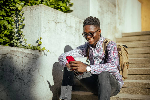 istock Man uses a mobile phone outdoors 1740466374