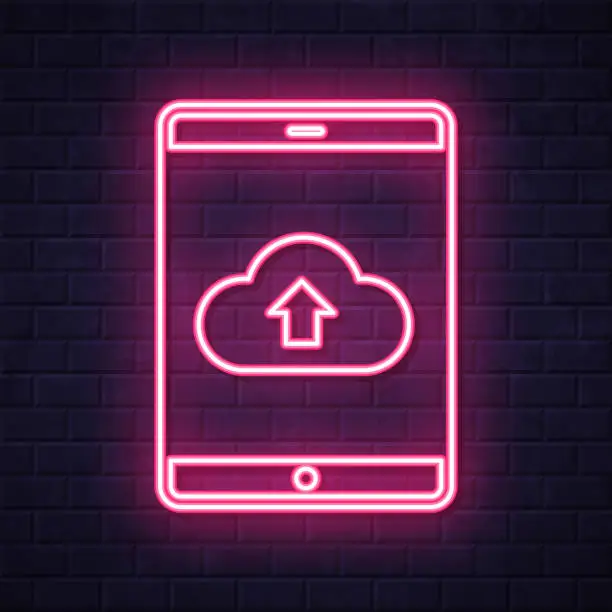 Vector illustration of Cloud upload from tablet PC. Glowing neon icon on brick wall background