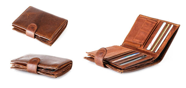 istock Set of old opened men's wallet isolated on white background 1740469867