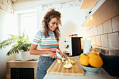 Woman cutting fruits