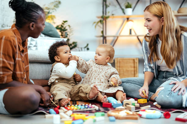 istock Best friends and their babies at home 1740475172