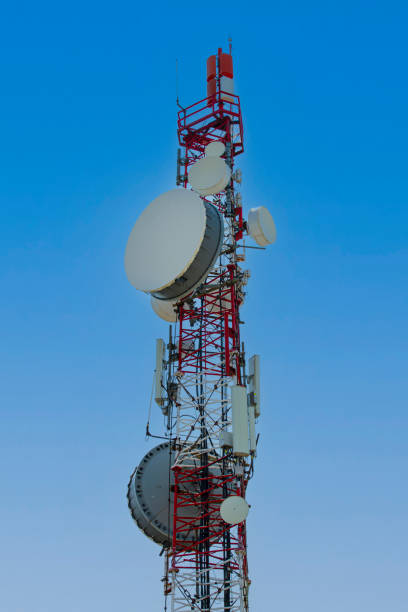 cell tower with antenna against blue sky - ancient civilization audio imagens e fotografias de stock